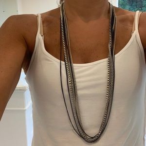 Great multi-strand necklace!  Silver tone and royal blue strands.